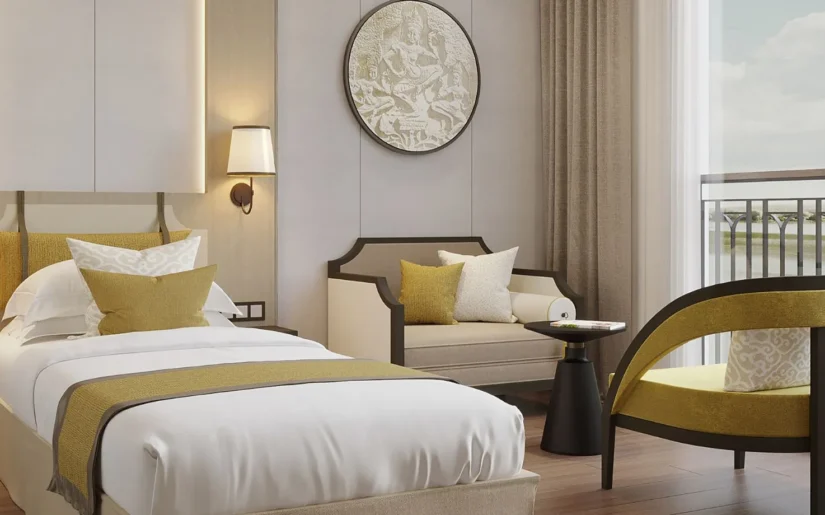 Mekong-Discovery-Suite Suite auf dem Flusskreuzfahrtschiff Mekong Discovery mit Doppelbett, Sitzmöbeln, Vorhängen